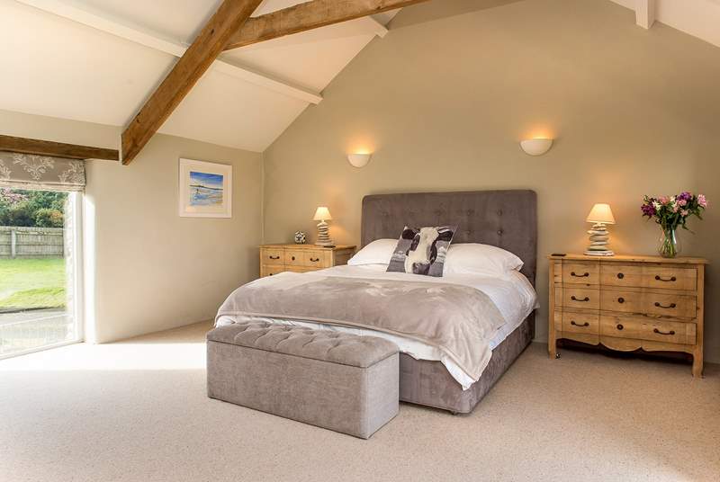 Bedroom four - the main bedroom - sits at the top of Mill Barn on the first floor.