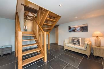 The open plan staircase leads off from the dining-area.