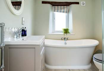 The family bathroom not only has a freestanding bath...