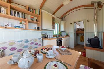 The lovely living-area leads through to the bedroom and en suite shower-room.