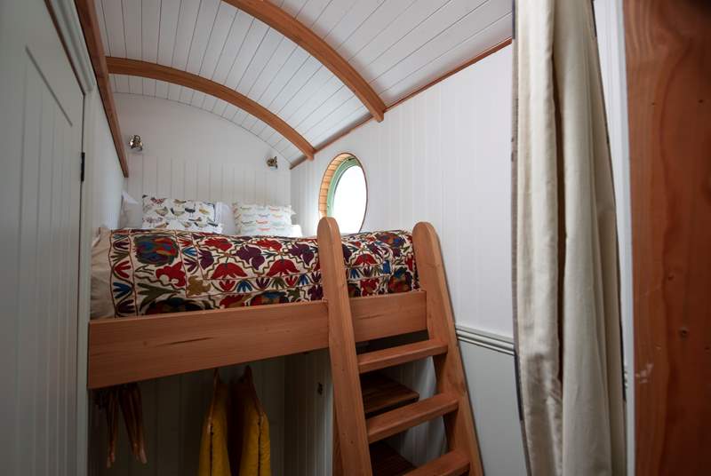 The double bed sits on a mezzanine level, which in turn makes the most of the glorious views.