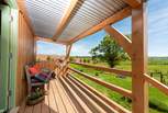 The raised deck is the perfect place to enjoy a glass of wine or two and drink in the far-reaching countryside views.