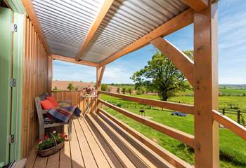 The raised deck is the perfect place to enjoy a glass of wine or two and drink in the far-reaching countryside views.