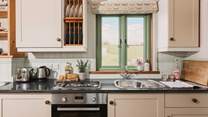 The kitchen has everything you need for your culinary creations, as well as another beautiful view.