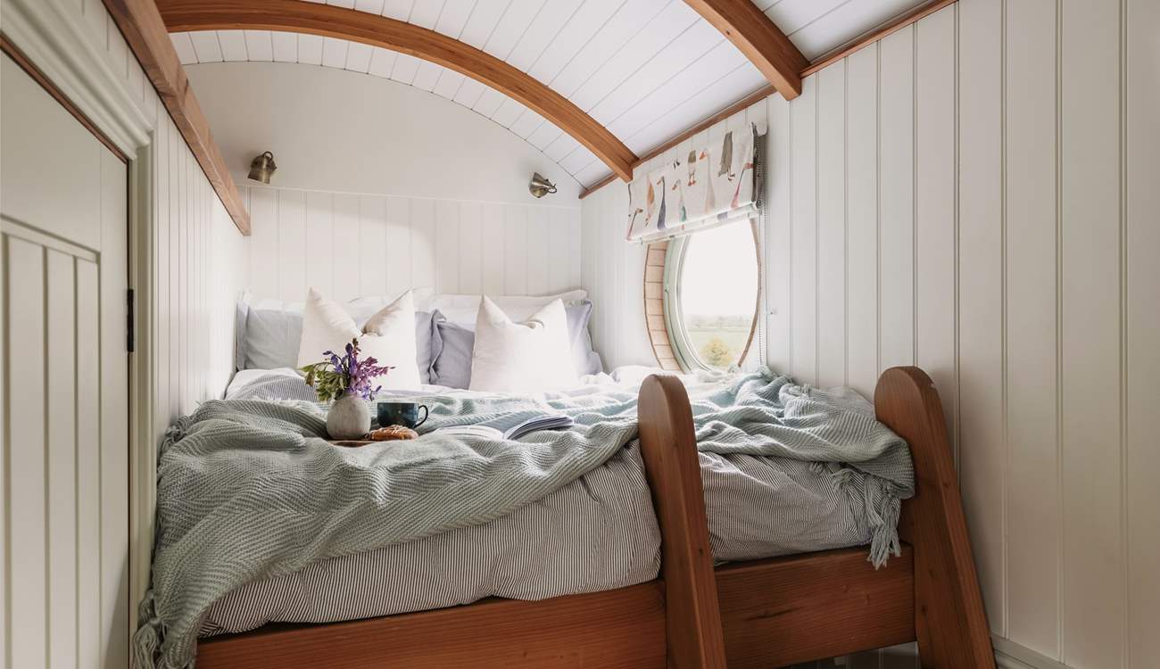 Climb the ladder to the comfy mezzanine double bed.