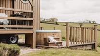 The bubbling hot tub is tucked away to the side of the hideaway, the perfect spot for star-lit evenings. 