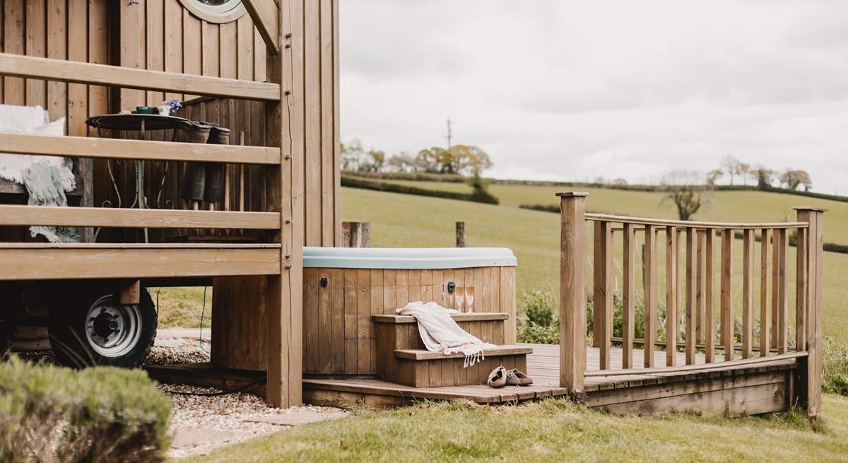 The bubbling hot tub is tucked away to the side of the hideaway, the perfect spot for star-lit evenings. 