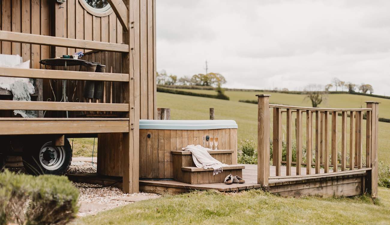 The bubbling hot tub is tucked away to the side of the hideaway, the perfect spot for star-lit evenings. 