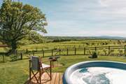 Enjoy magical moments from the warmth of the heavenly hot tub.