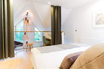 The galleried master bedroom on the top floor is something rather special (Bedroom 3).