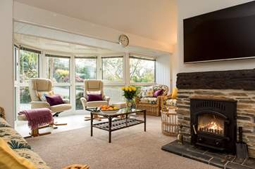 The wood-burner will keep you warm and toasty whatever the weather.
