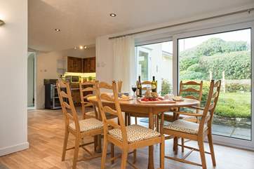 The dining-area enjoys views over the garden.