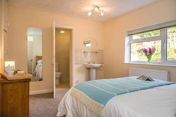 Bedroom 1 has a vanity unit in the bedroom and an en suite shower-room.