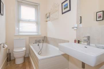Relax in some bubbles in the family bathroom.