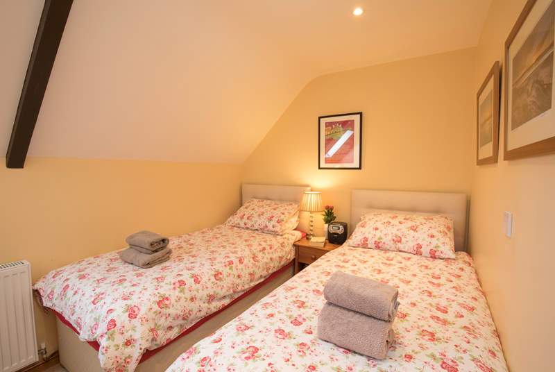 The twin bedroom is cosy and comfortable.