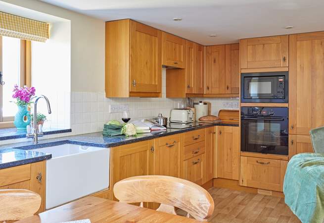 The kitchen with its integrated modern appliances.