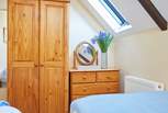 The twin bedroom has a wardrobe and a chest of drawers perfect place for your holiday clothes.