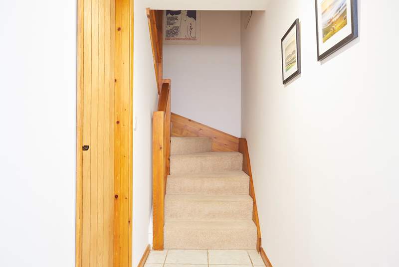 The stairs leading up to the shower room and bedrooms.