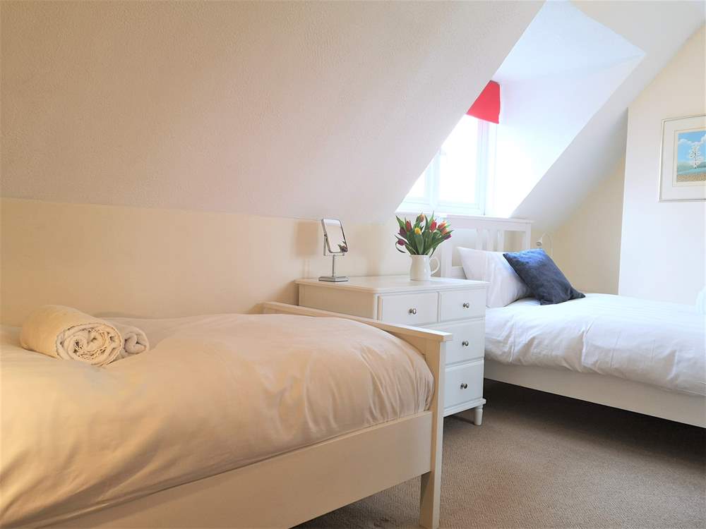The second bedroom with twin beds...