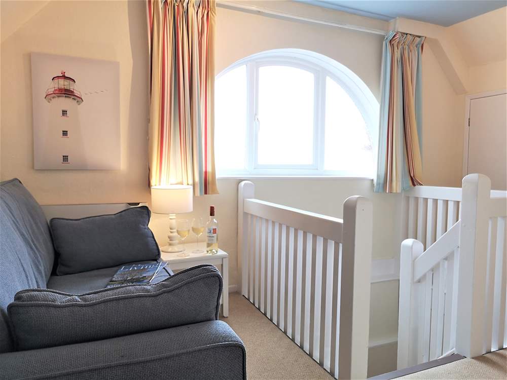 Please note there are internal and external stairs to this top floor apartment.