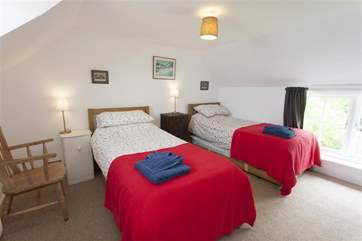 The twin bedroom is also bright and nicely appointed.