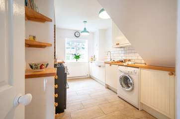 The kitchen has views out to the front garden.