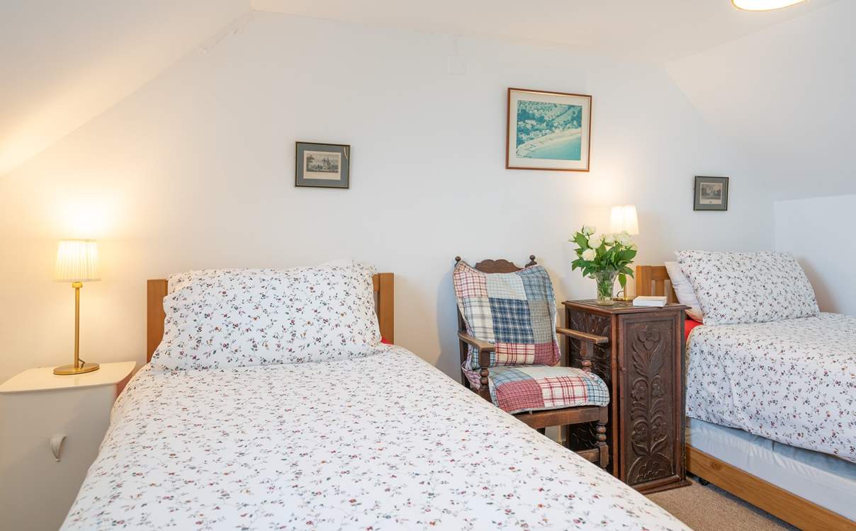 The twin bedroom is bright and nicely appointed.