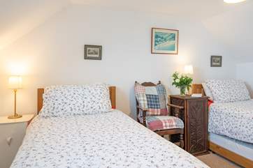 The twin bedroom is bright and nicely appointed.