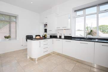 There's plenty of space in the kitchen, which leads out onto the main terrace.