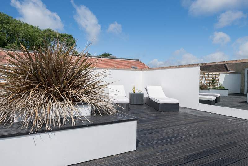 The secluded roof terrace is perfect for sunbathing.