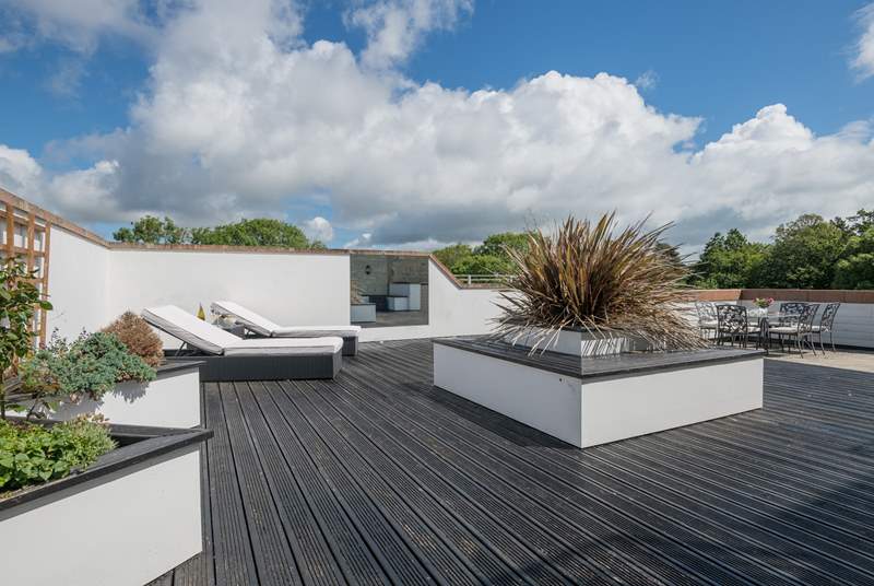 The roof terrace provides a large outside space for dining or sunbathing.