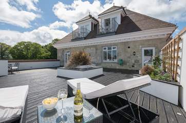 The large private terrace overlooking the communal gardens and parks beyond.