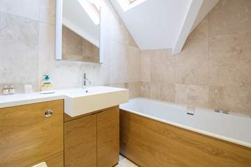 In addition to the two en suite shower-rooms there is a family bathroom.