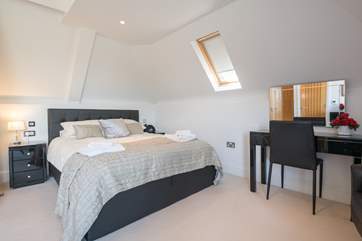 The master bedroom has its own private balcony.