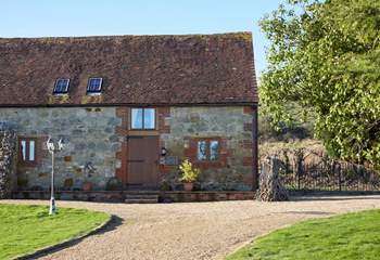 The main entrance to Oakham cottage is shared with Grafton Cottage through the large stable door.