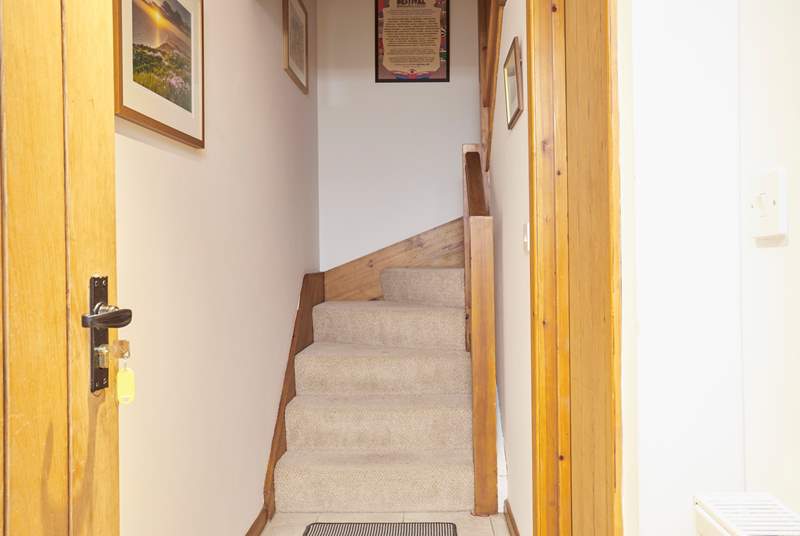The stairs leading up to the two bedrooms and shower room.