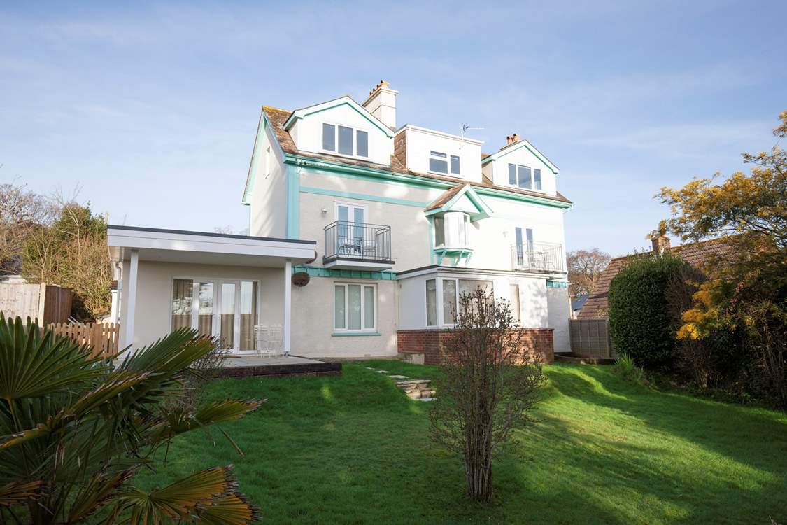 The back of the building, where you will find 2 Bermuda, overlooks a garden and countryside.