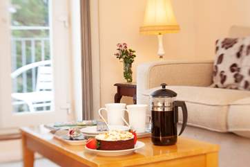 The bright sitting-room is a comfortable place to relax and unwind.