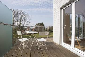 The sitting-room has a wrap-around balcony with a small table and chairs; the perfect place for a glass of vino whilst enjoying the views.