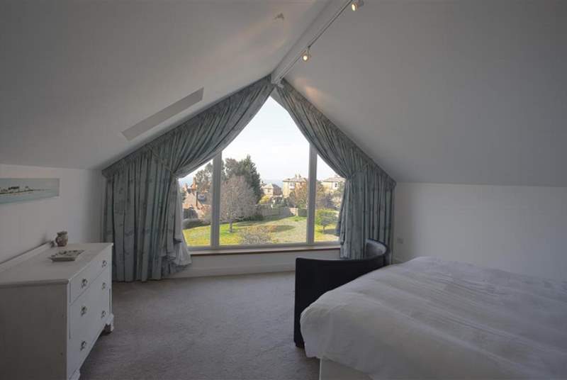 The main bedroom with views of the village and Solent beyond.