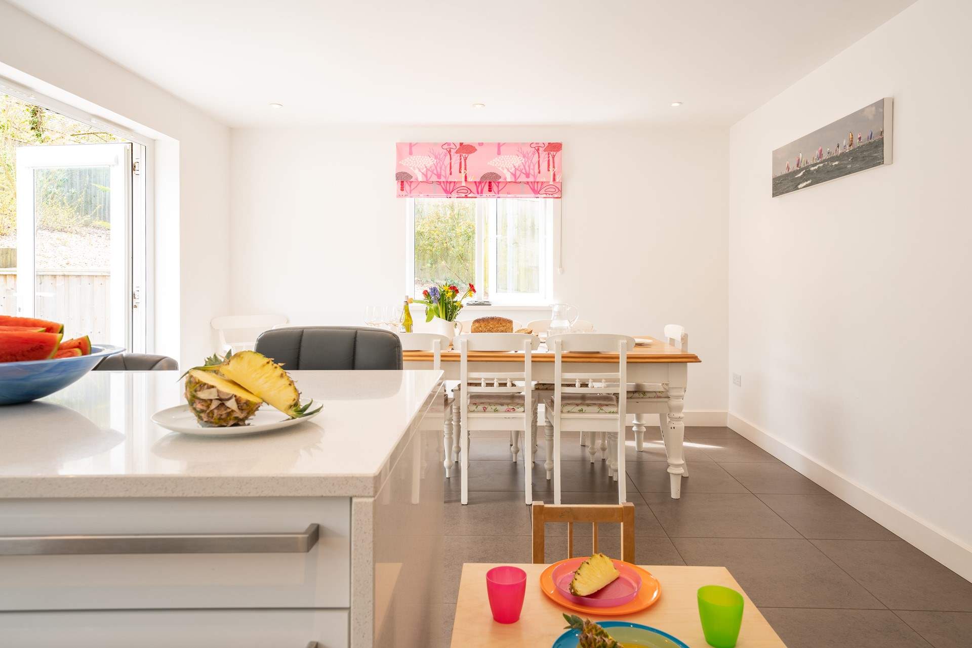 The kitchen-diner offers a sociable, open-plan space for family meal times. 