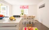 The kitchen-diner offers a sociable, open-plan space for family meal times.  - Thumbnail Image