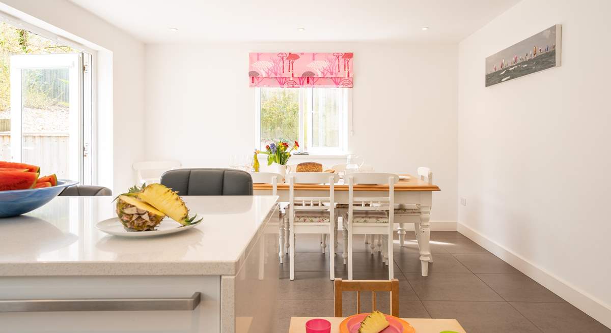 The kitchen-diner offers a sociable, open-plan space for family meal times. 