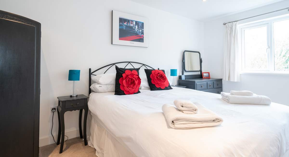 The bright and airy second bedroom on the first floor.