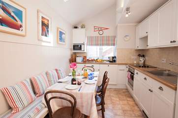 The lovely kitchen is well-equipped and is a cute space to cook up your favourite meal.