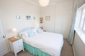 The master bedroom has spectacular views across the Solent to wake up to each morning.