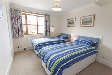 The larger of the twin bedrooms, ideal for adults or teenagers.