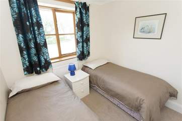 The smaller of the two twin rooms is perfect for children.