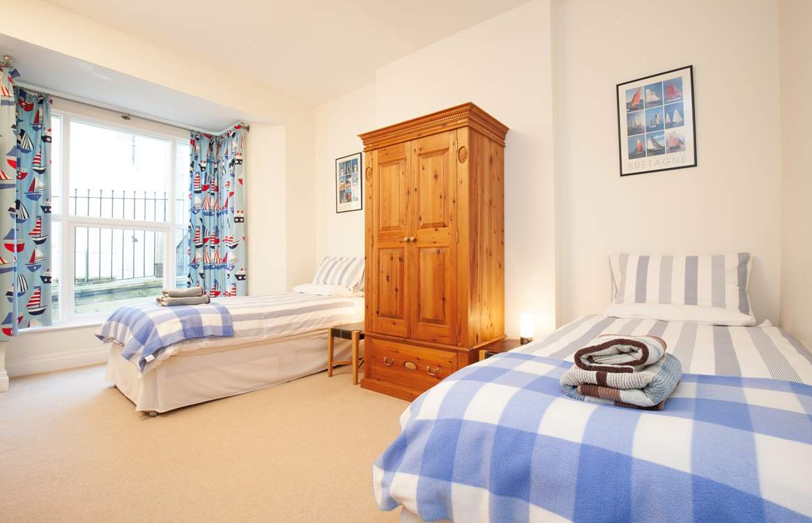 The spacious twin bedroom.