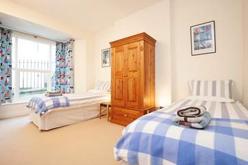 The spacious twin bedroom.